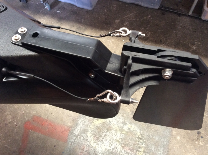 Attaching bracket and headstock
